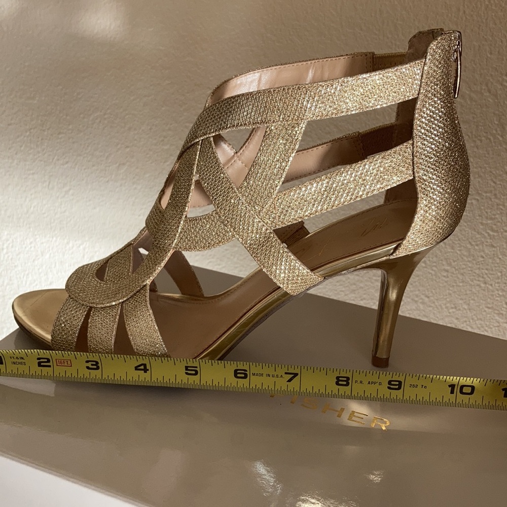 Marc Fisher gold evening sandals.